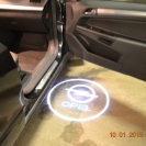 Лазерная проекция логотипа автомобиля Опель