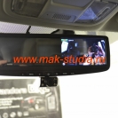Видеорегистратор в зеркале заднего вида: камера повёрнута в салон и ведёт запись.